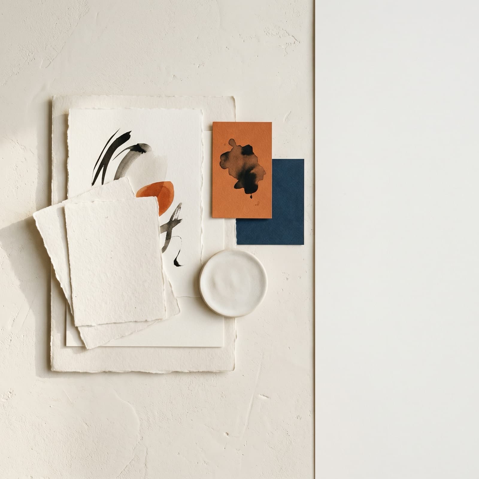 Editorial flat lay of labeled cards on a warm off-white Nordic surface, suggesting schema markup that AI search can read.