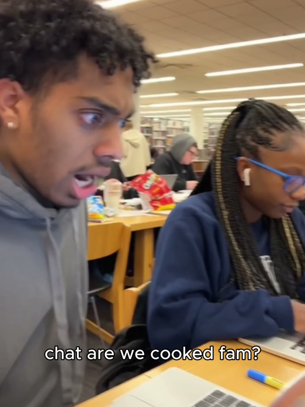 AI-generated UGC library study scene for an edtech brand
